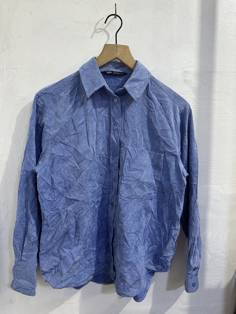 Zara Corduroy Button-Up Shirt (Category: Shirts) located in San Jose del Monte. Submitted by bizzybeebyhgc (Listing ID 1463829528, Image 1). Description: - Zara blue corduroy shirt - Long sleeves with button cuffs - Features a chest pocket - Nice fabric texture - Relaxed fit for comfortable wear - Perfect for casual outfits - Easy to style.