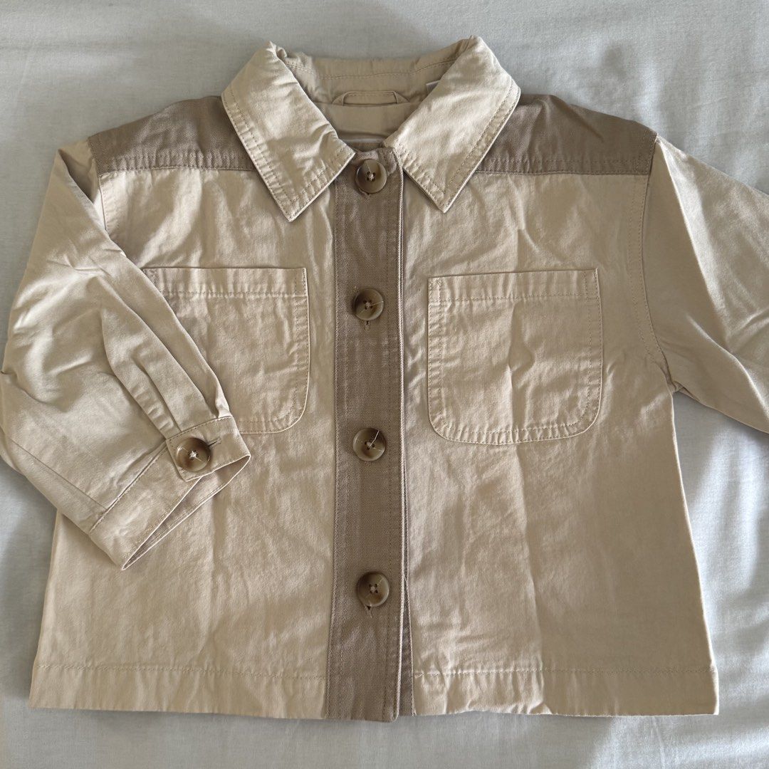 Zara Kids Utility Button-Up Jacket (Category: Babies & Kids Fashion) located in Quezon City. Submitted by whippah (Listing ID 1463865369, Image 1). Description: - Zara Kids Colorblock Jacket - Colors: Beige and Tan - Button-up front - Two chest pockets - Long sleeves with button cuffs - Lined interior with name tag - Ideal for layering SUPER NICE QUALITY IN PERSON!!.