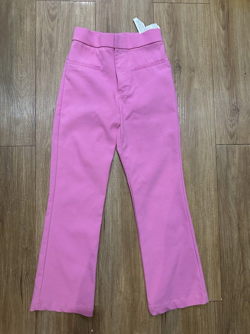 Zara Pink Trousers (Category: Jeans) located in Las Pinas. Submitted by petiteclothes_2000 (Listing ID 1463831966, Image 3). Description: - message me for measurements :) - sooo cute! perfect barbie pink - High-waisted pink pants - Flare at the bottom - Cropped length - Front pockets - Perfect for dressing up or down - Pair with sneakers or heels.