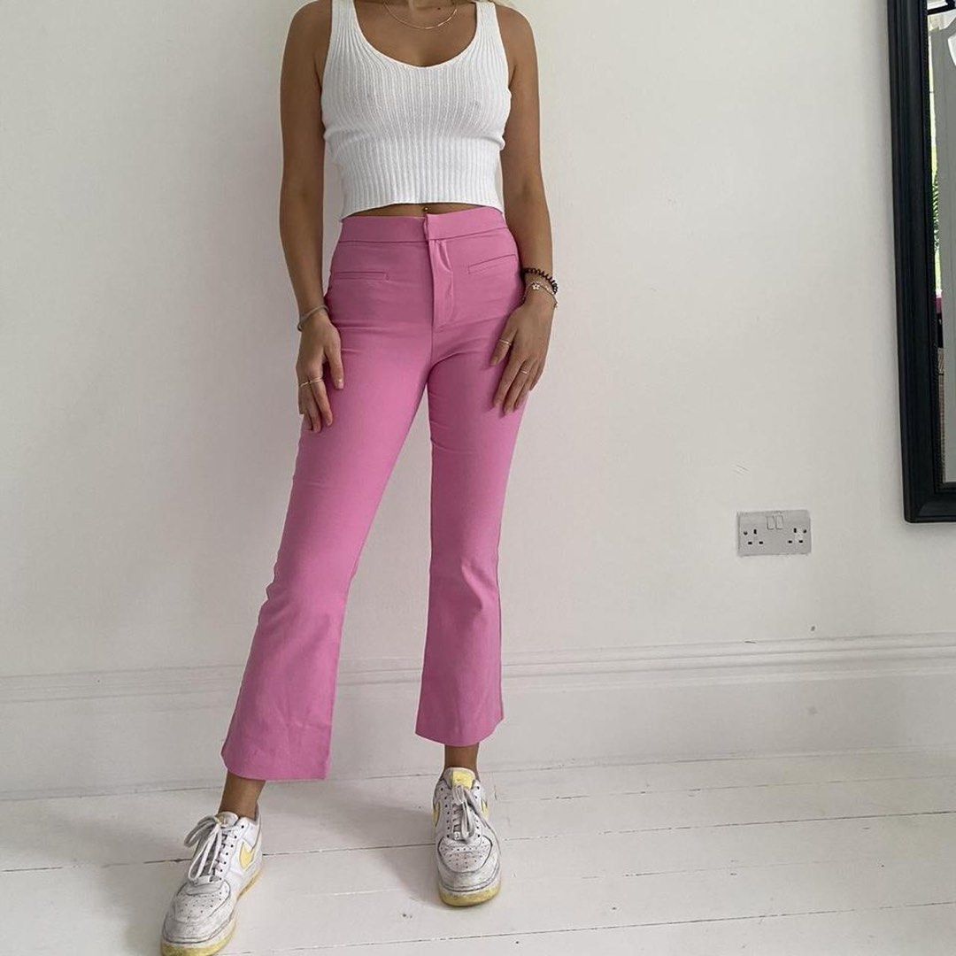 Zara Pink Trousers (Category: Jeans) located in Las Pinas. Submitted by petiteclothes_2000 (Listing ID 1463831966, Image 2). Description: - message me for measurements :) - sooo cute! perfect barbie pink - High-waisted pink pants - Flare at the bottom - Cropped length - Front pockets - Perfect for dressing up or down - Pair with sneakers or heels.