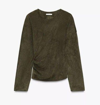 Zara Ruched Long Sleeve Top Olive Green (Category: Longsleeves) located in Quezon City. Submitted by myclosetedit (Listing ID 1463880475, Image 1). Description: - Zara olive green long-sleeved top - Features ruched detail on the side - Unique draped silhouette - Versatile: dress up or down - Comfortable and stylish for any occasion.