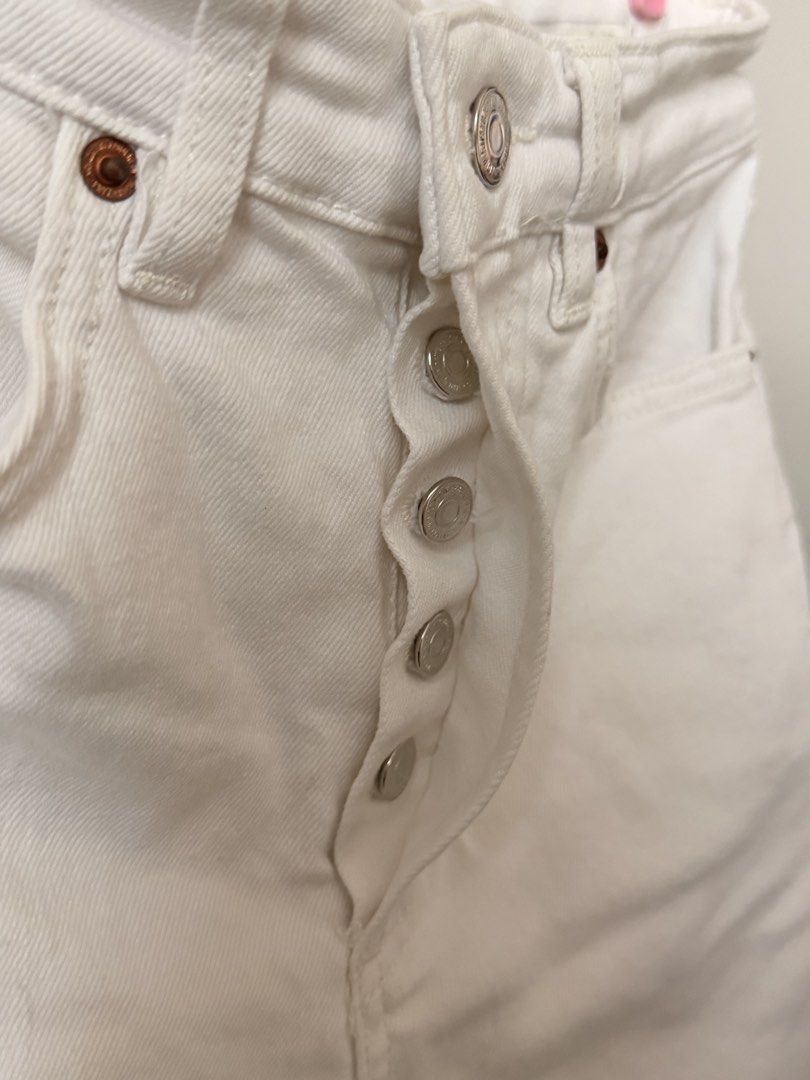 Zara The Deed Flare White Button Fly Jeans (Category: Jeans) located in Quezon City. Submitted by ninny.ph (Listing ID 1463860549, Image 3). Description: - Zara white jeans - High-waisted style - Button fly closure - 'The Deed Flare' model - Raw hem - Versatile staple piece, easy to dress up or down.