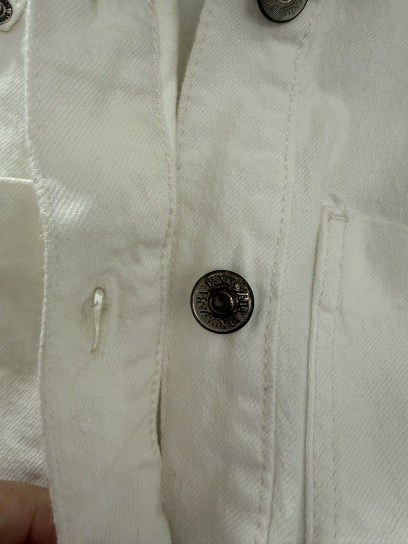 Zara White Denim Button-Up Dress Size M (Category: Dresses) located in Pasig City. Submitted by atbp__ (Listing ID 1463754418, Image 2). Description: - Zara white denim dress, see pictures,tarnish button - Button-up front with chest pockets (best fits small) - Long sleeves - Made in Turkey - Versatile for casual or dressed-up occasions.