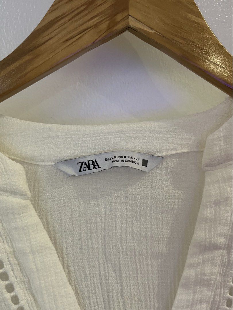 Zara white embroidered top (Category: Longsleeves) located in Rizal. Submitted by jn_mdl (Listing ID 1463862886, Image 3). Description: Oversized 19 inches length 19 inches width laid flat.