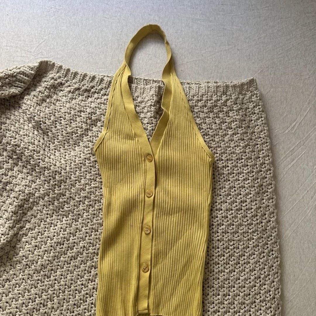 Zara Yellow Ribbed Halter Top (Category: Sleeveless) located in Manila. Submitted by vls10 (Listing ID 1463925403, Image 3). Description: - Ribbed material - Size M - Working buttons - unique shade of yellow - used 2x only! Selling for PHP 550 :) 📍: Quezon City (near city hall) 💵: Gcash/ BPI Bank Transfer 📦: c/o buyer (can do SDD or J&T).