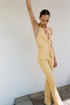 Zara Yellow Ribbed Halter Top (Category: Sleeveless) located in Manila. Submitted by vls10 (Listing ID 1463925403, Image 2). Description: - Ribbed material - Size M - Working buttons - unique shade of yellow - used 2x only! Selling for PHP 550 :) 📍: Quezon City (near city hall) 💵: Gcash/ BPI Bank Transfer 📦: c/o buyer (can do SDD or J&T).