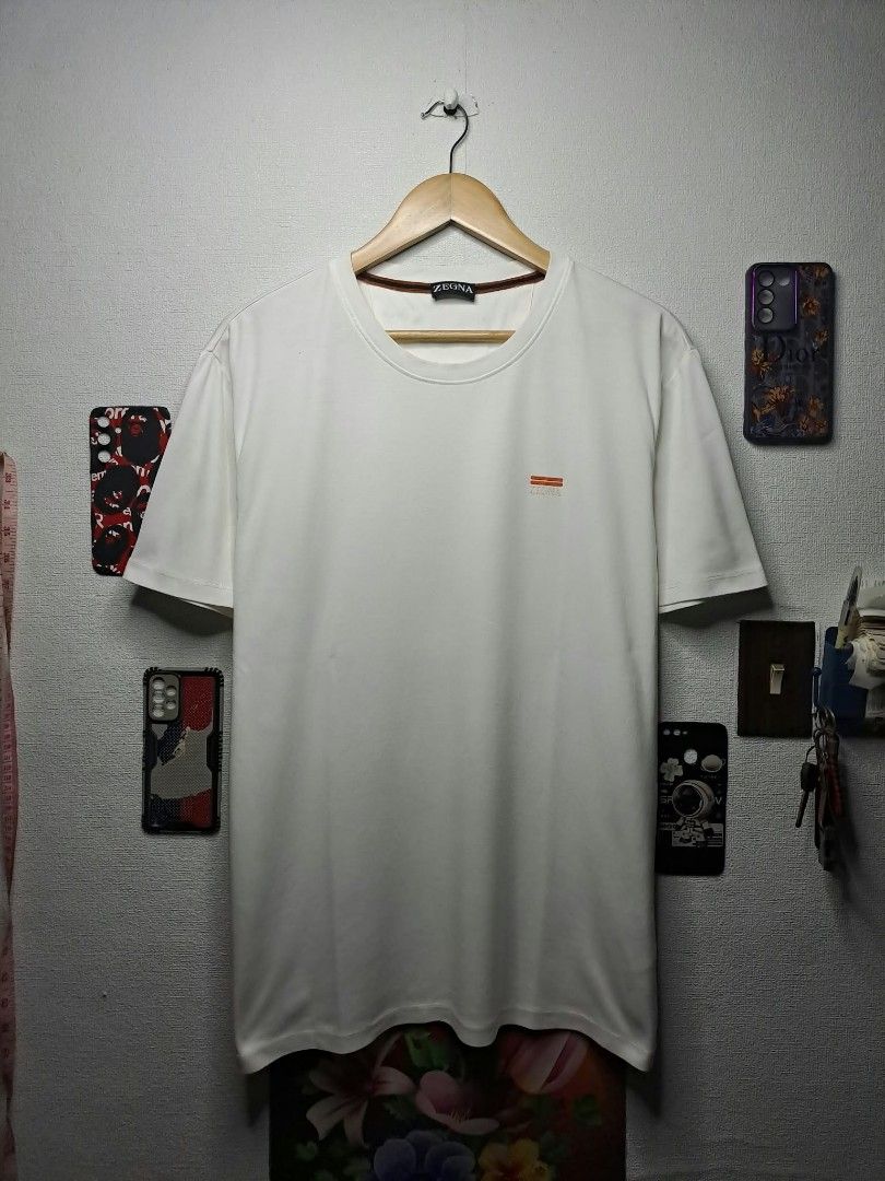 Zegna Basic White (Category: Luxury Apparel) located in Quezon City. Submitted by yaseen73 (Listing ID 1463797212, Image 1). Description: Zegna Rubberized Logo Cotton Fabric Stretchy Wearing Siz: XXL on Tag Dimensions : Please Refer to the Photo Color Rate : 9.5/10 - With Pinhole Issue - Minimal Cracks on Logo - Condition : 4.5/5 Off / Legit 450.00 Shipped Via J&T Around Metro Manila MOP : G C A S H B A N K T R A N S F E R Seller's Location : 📍B