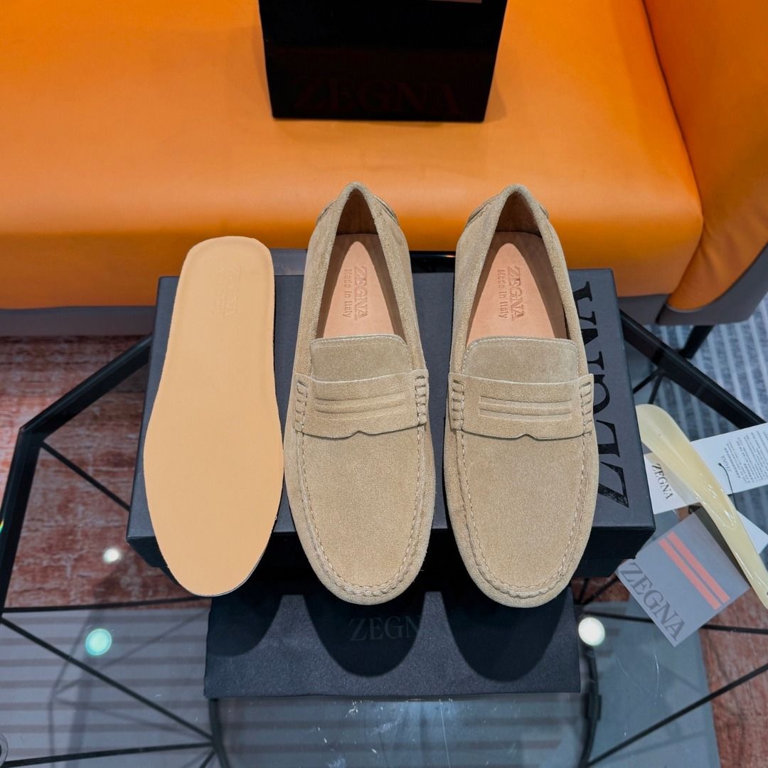 Zegna Suede Loafers - Tan (Category: Dress Shoes) located in Manila. Submitted by royalwater-ad1f21 (Listing ID 1463811694, Image 1). Description: Cowhide/Shiny Leather Business Casual Men's Loafers, Driving Shoes! High-end version/Men's premium style! A sharp and modern creation, classic loafer design, made with imported cowhide/upper, Goodyear cold-glue craftsmanship, hand-filled technique, exquisite hand-stitched Martingale 3D stitching, paire