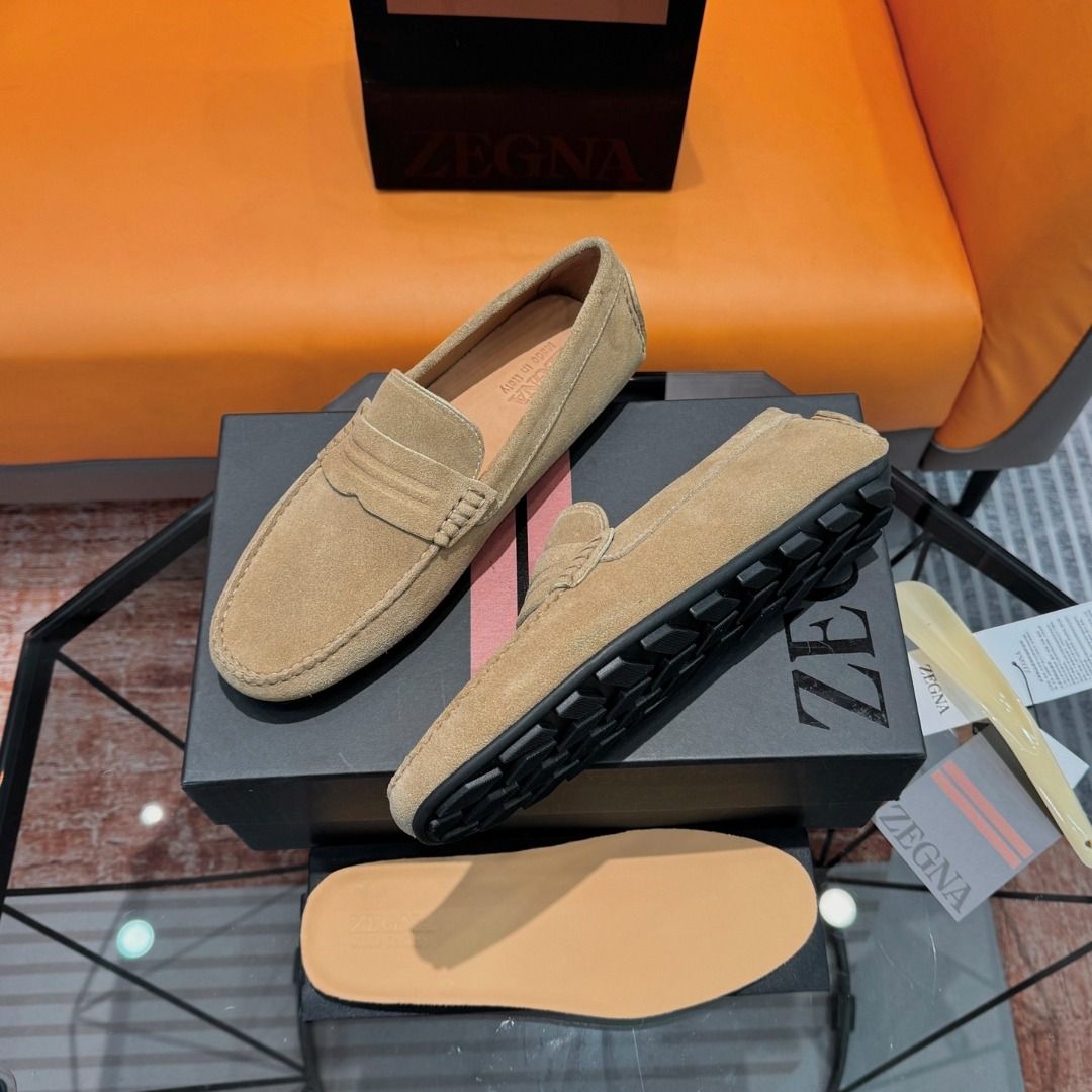 Zegna Suede Loafers - Tan (Category: Dress Shoes) located in Manila. Submitted by royalwater-ad1f21 (Listing ID 1463811694, Image 3). Description: Cowhide/Shiny Leather Business Casual Men's Loafers, Driving Shoes! High-end version/Men's premium style! A sharp and modern creation, classic loafer design, made with imported cowhide/upper, Goodyear cold-glue craftsmanship, hand-filled technique, exquisite hand-stitched Martingale 3D stitching, paire
