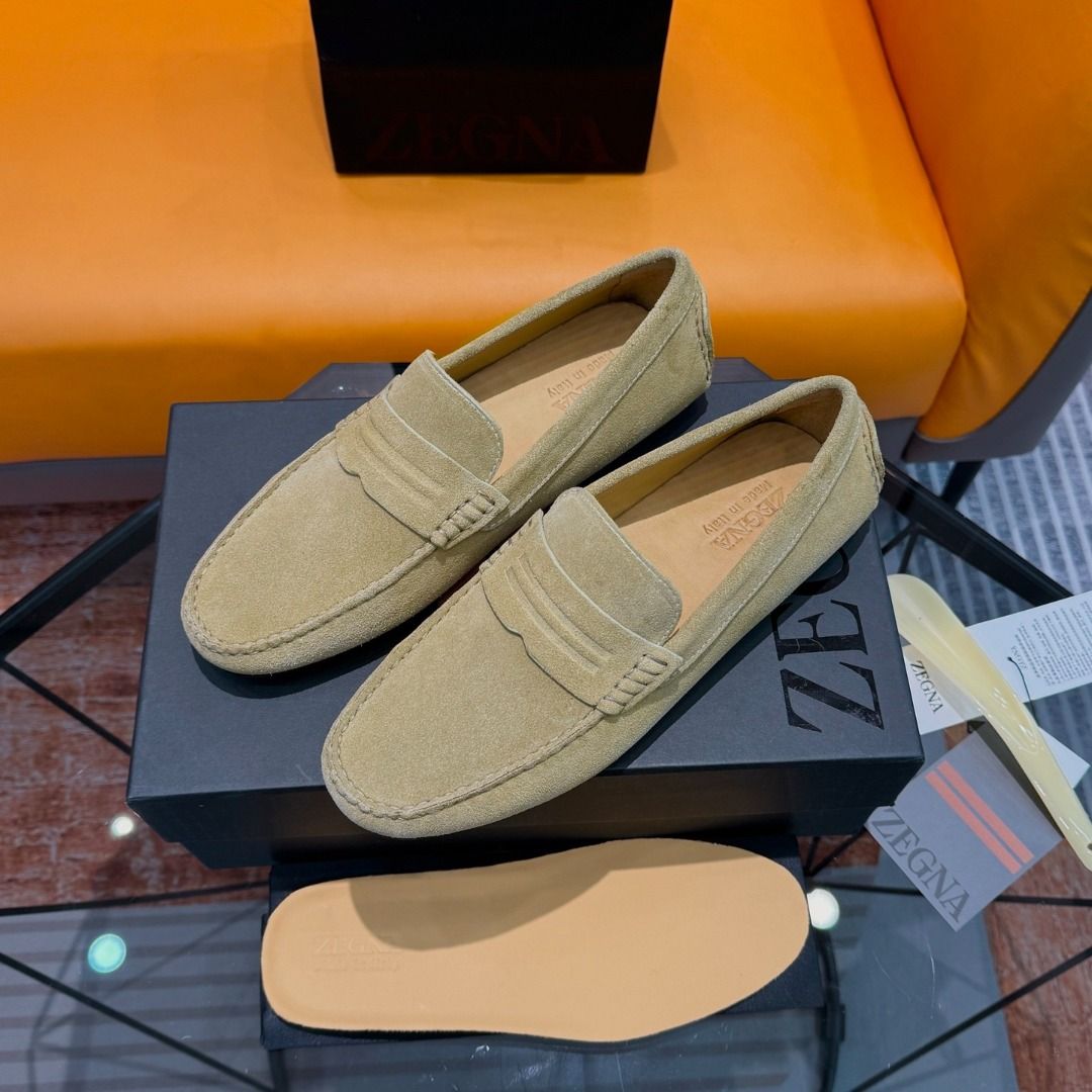 Zegna Suede Loafers - Tan (Category: Dress Shoes) located in Manila. Submitted by royalwater-ad1f21 (Listing ID 1463811694, Image 2). Description: Cowhide/Shiny Leather Business Casual Men's Loafers, Driving Shoes! High-end version/Men's premium style! A sharp and modern creation, classic loafer design, made with imported cowhide/upper, Goodyear cold-glue craftsmanship, hand-filled technique, exquisite hand-stitched Martingale 3D stitching, paire