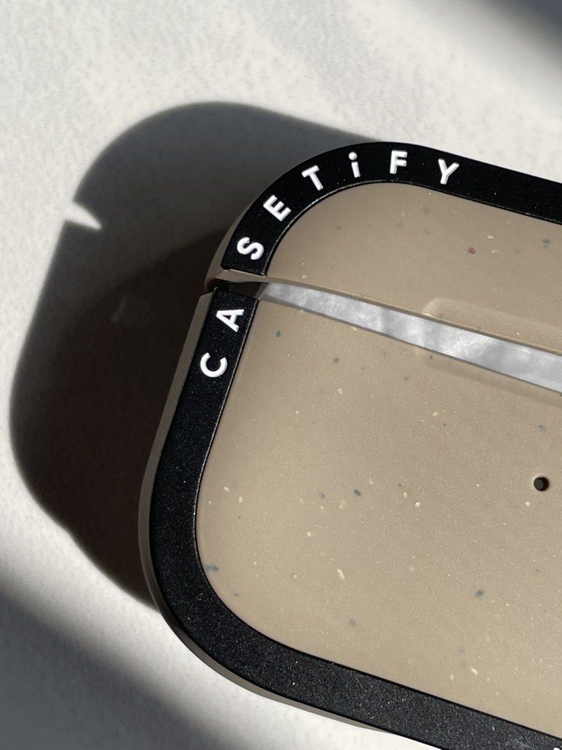 100% Authentic CASETiFY Bounce Case for Apple AirPods Pro 2 (Category: Portable Audio Accessories) located in Floridablanca. Submitted by gwnethmercado (Listing ID 1463964890, Image 3). Description: COLOR: Matte Taupe (Sleek earth-toned neutral body with matte black protective corner bumpers) CONDITION: - Case & Carabiner: 100% Brand New and never been used. Completely clean and pristine. - Packaging: Outer box has some minor creases and storage 