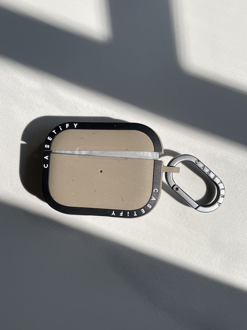 100% Authentic CASETiFY Bounce Case for Apple AirPods Pro 2 (Category: Portable Audio Accessories) located in Floridablanca. Submitted by gwnethmercado (Listing ID 1463964890, Image 1). Description: COLOR: Matte Taupe (Sleek earth-toned neutral body with matte black protective corner bumpers) CONDITION: - Case & Carabiner: 100% Brand New and never been used. Completely clean and pristine. - Packaging: Outer box has some minor creases and storage 
