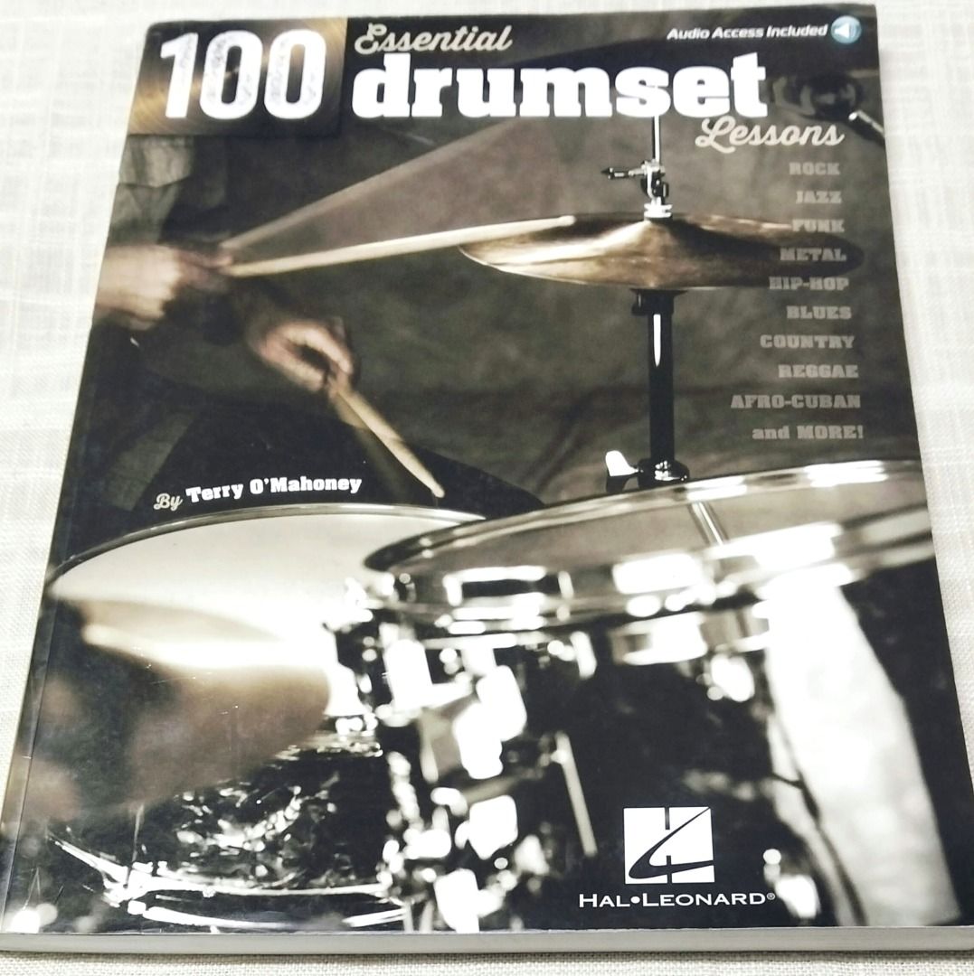100 Essential Drumset Lessons Book by Terry O'Mahoney (Category: Textbooks) located in Taguig. Submitted by Negosyokoto (Listing ID 1464065365, Image 1). Description: - 100 essential drumset lessons - Covers rock, jazz, funk, metal, hip-hop, blues, country, reggae, afro-cuban, and more - Includes exercises and audio tracks - Suitable for drummers of all levels - Learn new techniques and styles.