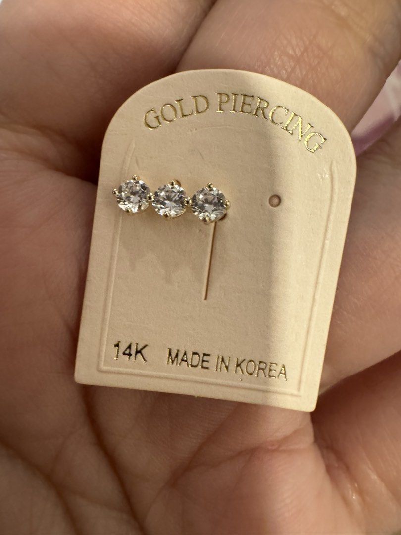 14K Gold Piercing Earrings (Category: Earrings) located in San Mateo. Submitted by donnalewisss (Listing ID 1464050070, Image 3). Description: - 1pc per design -Two pairs of 14K gold piercing earrings - Made in Korea - Style 1: Three small stones in a line - Style 2: Three stones stacked vertically - Ideal for ear cartilage - Adds a touch of sparkle -sold per piece -screw lock.