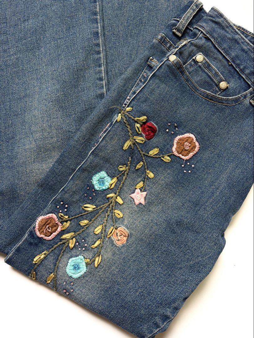 2000’s fairy embroid flower flared pants (Category: Jeans) located in Tarlac. Submitted by pearl_xoxo (Listing ID 1464099140, Image 3). Description: - 2000’s fairy embroid flower flared pants bust: “ waist: 28-30 length: 37” size: issue: needwash brand: jeans dictionary .