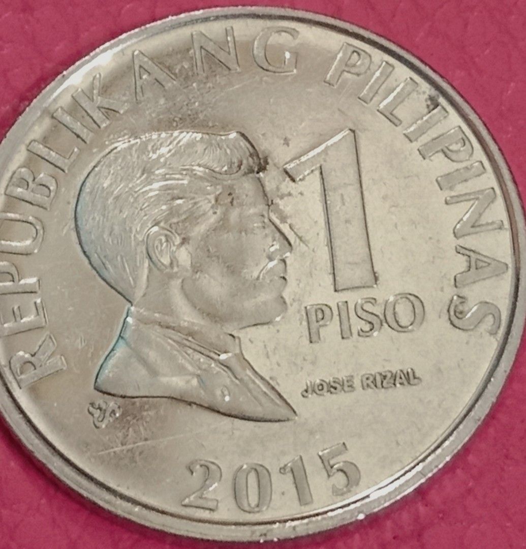 2015 1 piso reverse frosted (Category: Currency) located in Manila. Submitted by bbonggeez14 (Listing ID 1464097634, Image 1). Description: - Authentic Philippine 1 Peso coins - Features Jose Rizal on one side - Bangko Sentral ng Pilipinas logo on the other - Includes one coin dated 2015 - Includes one coin dated 1993 - Ideal for coin collectors - Great as a unique souvenir - Add this piece of Philippine history to your collection.