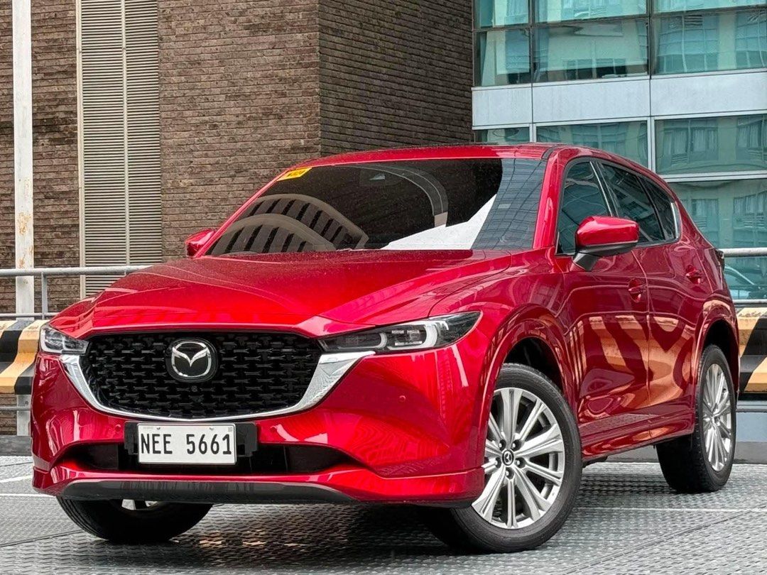 2023 Mazda CX5 AWD TURBO Auto (Category: Used Cars) located in Makati City. Submitted by carlbonnevie17 (Listing ID 1464020496, Image 1). Description: 2023 Mazda CX5 2.5 AWD Turbo AT GAS 12K Mileage (Casa Maintained) Cash Price - ₱1,598,000 only! FINANCING COMPUTATION: OPTION 1: Subject to Credit Evaluation ₱129K ALL-IN CASHOUT (chattel and insurance included) 2 years: ₱88,788 3 years: ₱64,145 4 years: ₱53,190 📍 GROUND FLOOR — VALERO CAR PARK 2,
