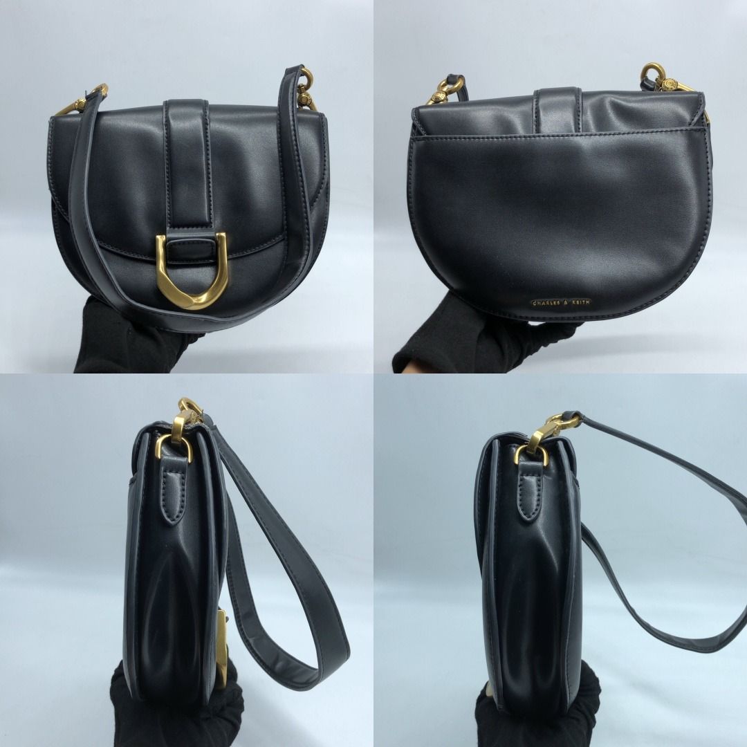267009375 CHARLES & KEITH BAG SADDLE LEATHER BAG (Category: Luxury Bags & Wallets) located in Taguig. Submitted by ecoring.ph (Listing ID 1464031181, Image 2). Description: ◆CONDITION: B- ◆DESCRIPTIONS: (Other defects/info:) OUTER: The body of the bag is scratched, scuffed, stained, dirty, wrinkled, deformed, press marks and shows sign of use. The leather at the gussets, bottom, and flap of the bag is scratched, scuffed, stained, dirty, wrinkled,