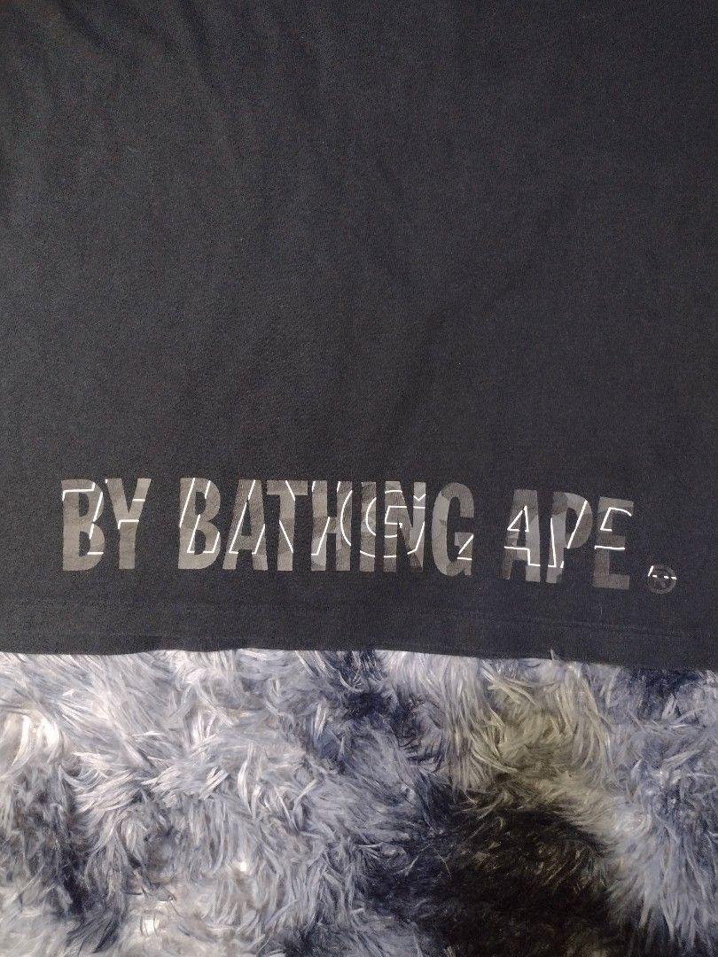 A Bathing Ape BAPE Camo Ape Head Tee Black (Category: Tshirts & Polo Shirts ) located in Rizal. Submitted by keepthrift15 (Listing ID 1464054759, Image 3). Description: Bape Black Camo Ape Face Authentic Size small on tag, 19x27 No issue Excellent condition (9.5/10) ₱1,400 (negotiable) Color may vary due to lighting .