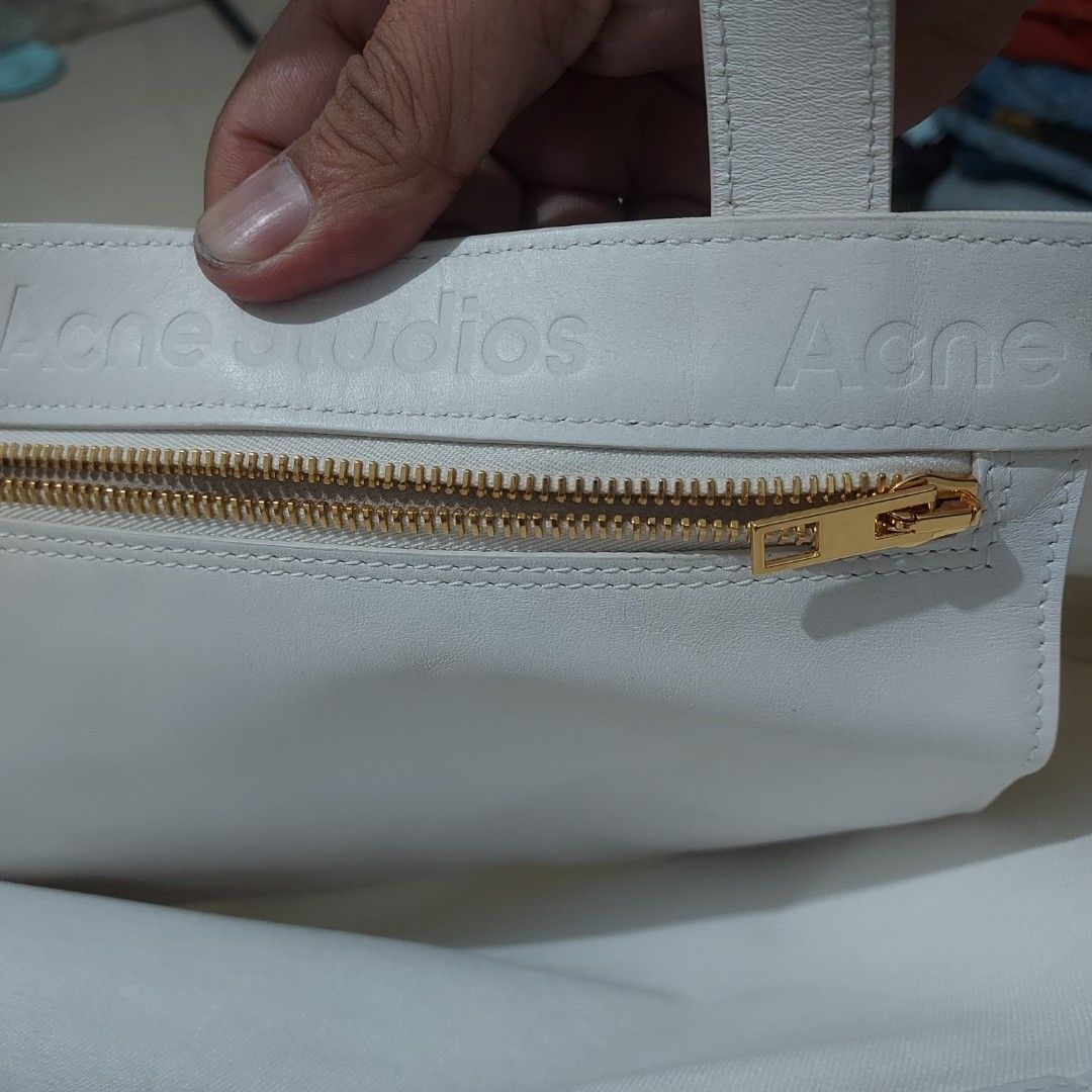 Acne totebag (Category: Tote Bags) located in Puerto Princesa. Submitted by helwapalawan (Listing ID 1463950257, Image 3). Description: Acne studios white with leather inner issue with yellow wish part only authntc 1000 freeship.
