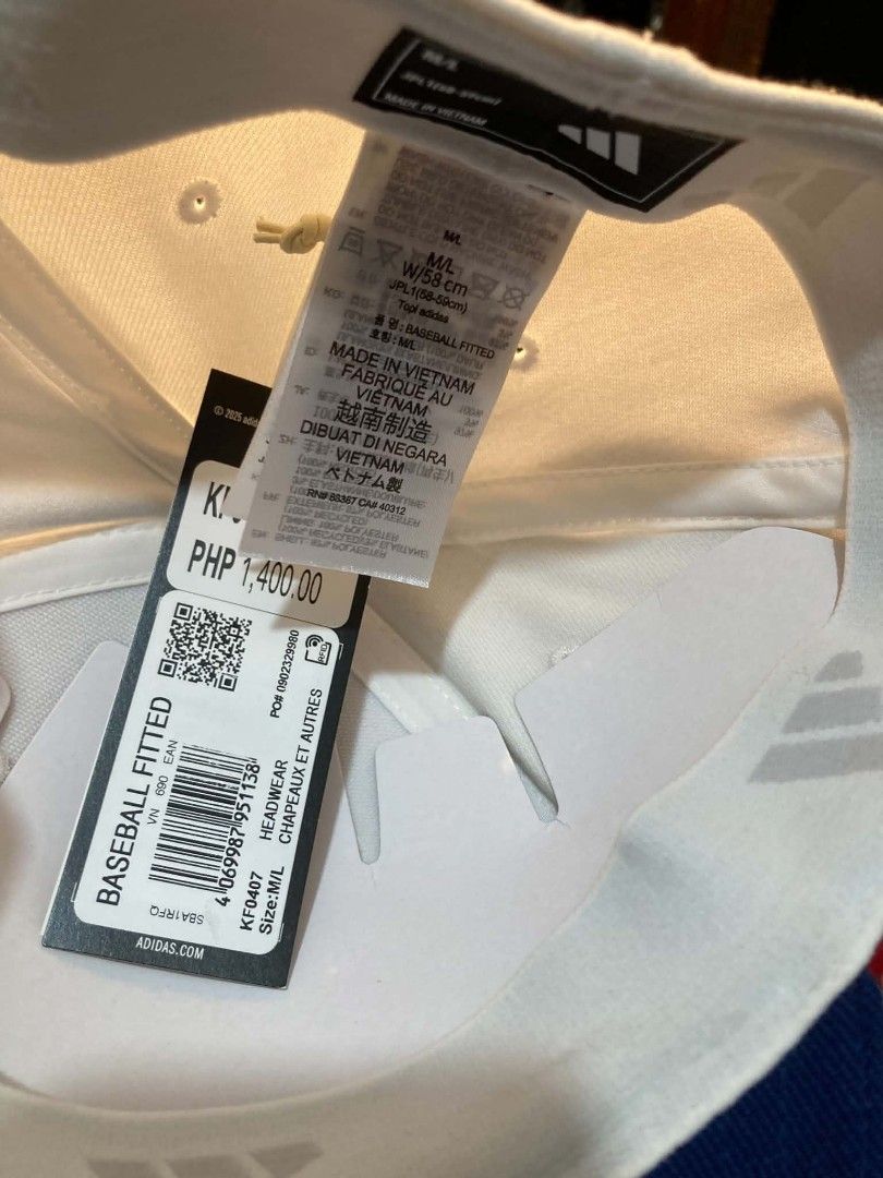 Adidas Baseball Cap - White/Blue - Size M/L (Category: Caps & Hats) located in Trece Martires City. Submitted by djaothriftshop (Listing ID 1463972477, Image 2). Description: - Adidas baseball cap - Color: White crown with navy blue brim and logo - Size: M/L, fits 58cm - Origin: Made in Vietnam - Condition: Original tag attached - Original Price: PHP 1,400.00 - Ideal for: Everyday wear.