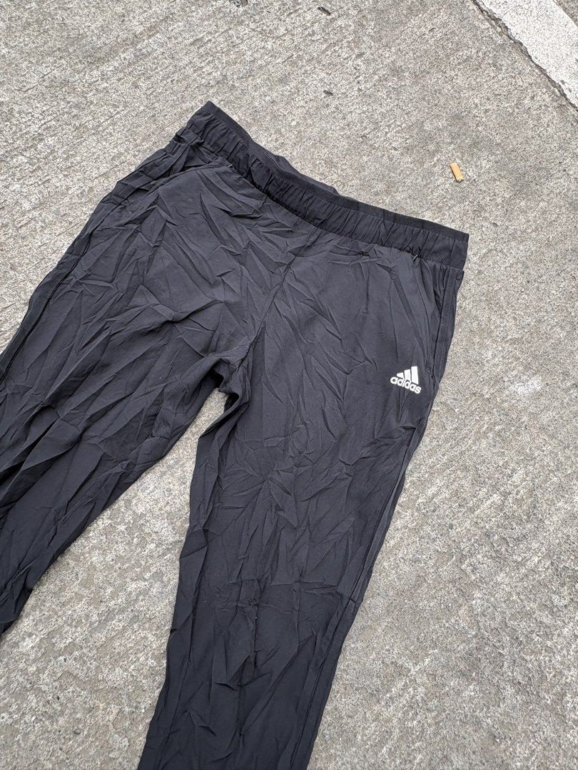 Adidas Black Jogger Pants DY8698 (Category: Joggers) located in Iligan City. Submitted by seddicmoti2002 (Listing ID 1463981664, Image 2). Description: - Black Adidas jogger pants - Made with 86% recycled polyester & 14% elastane - Recycled polyester pocket lining - Elastic waistband with drawstring - Cuffed ankles - Ideal for workouts or casual wear.