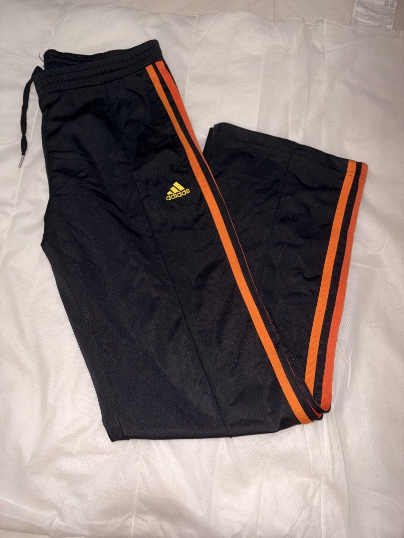 Adidas Black Orange Track Pants Size S (Category: Activewear) located in Dasmarinas. Submitted by thriftcavite (Listing ID 1463941608, Image 1). Description: Issue: medyo maluwag na yung garter sa waist .