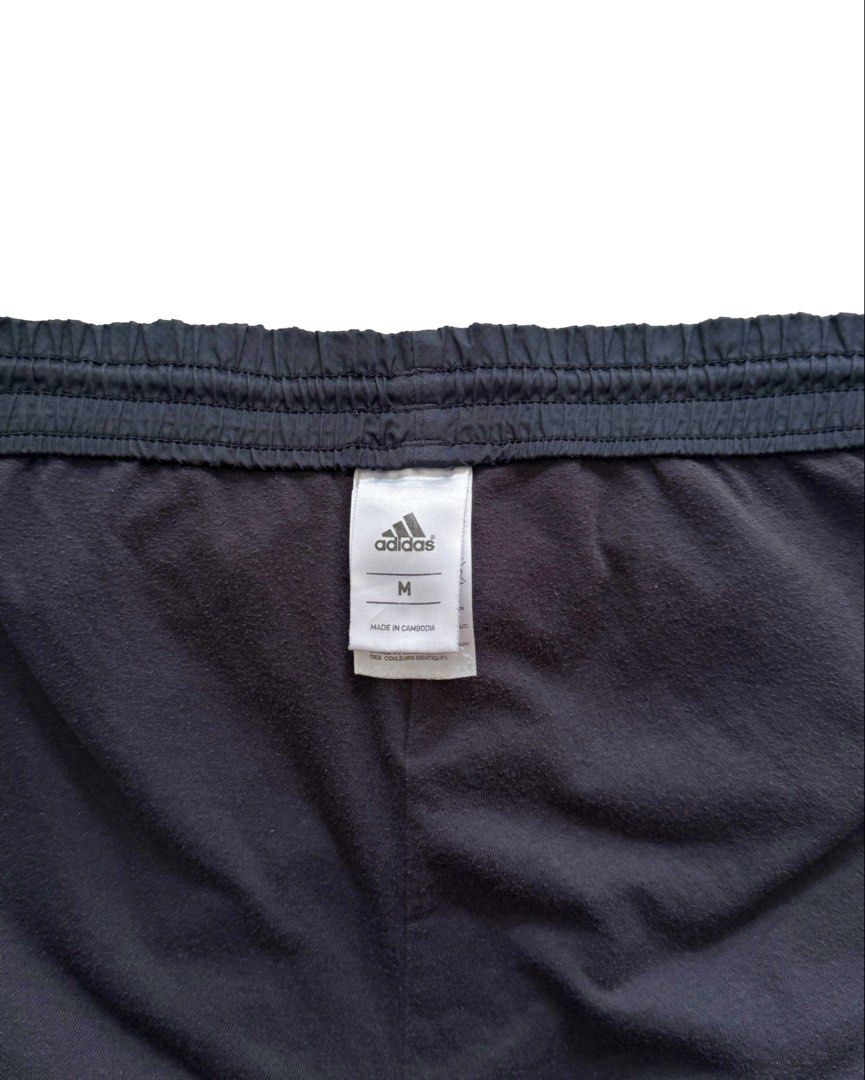 Adidas Black Track Pants (Category: Joggers) located in Manila. Submitted by morf_sply (Listing ID 1464001730, Image 3). Description: Loose fit classic sport tracksuit bottoms with inner layering and technical utility fabric for intense workout. Bold stripes sideways with a drawcord closure for an adjustable fit. Heel bite. M on tag Waist 32-34 in Rise 11 in Inseam 28 in Length 39 in Leg Opening 9 in .