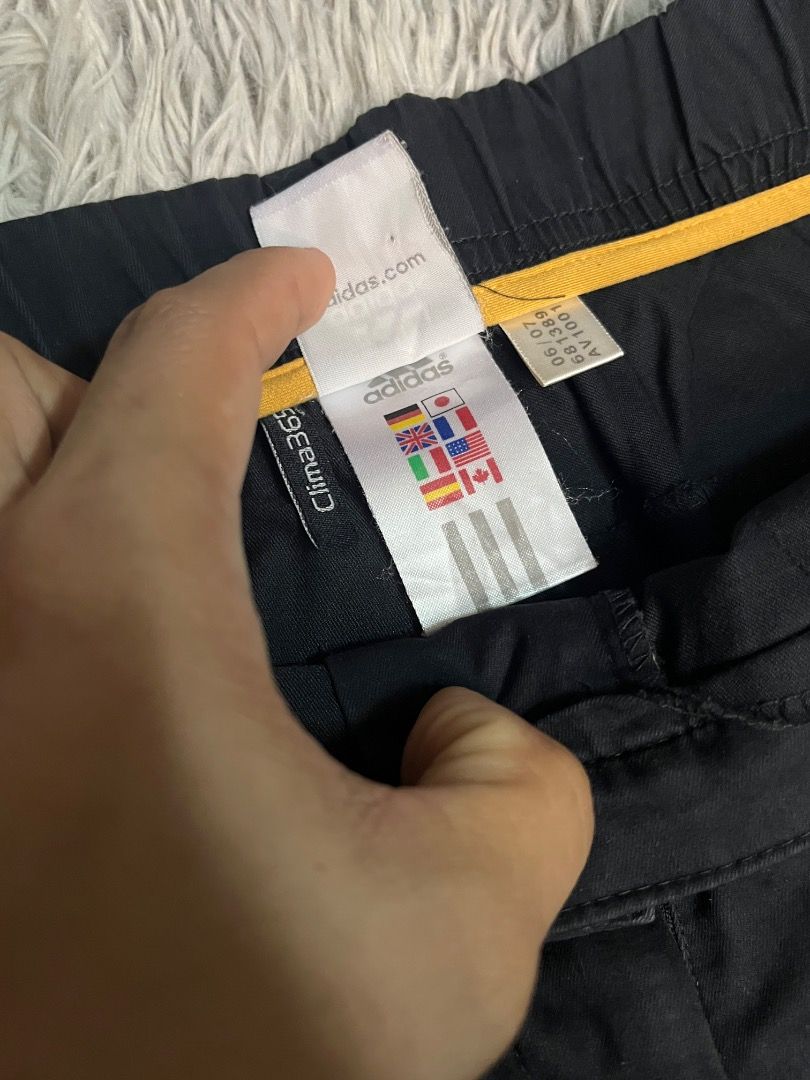 Adidas Clima365 Track Pants Black White Stripes (Category: Joggers) located in Muntinlupa City. Submitted by pastforwardthrift (Listing ID 1464097704, Image 3). Description: - Black Adidas track pants - White stripes down the sides - Clima365 material for comfort and performance - Elastic waistband with adjustable drawstring - Zippers at the ankle for easy on/off - Size Medium (M) - Ideal for sports, gym, or everyday casual wear.