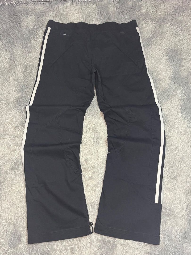 Adidas Clima365 Track Pants Black White Stripes (Category: Joggers) located in Muntinlupa City. Submitted by pastforwardthrift (Listing ID 1464097704, Image 2). Description: - Black Adidas track pants - White stripes down the sides - Clima365 material for comfort and performance - Elastic waistband with adjustable drawstring - Zippers at the ankle for easy on/off - Size Medium (M) - Ideal for sports, gym, or everyday casual wear.