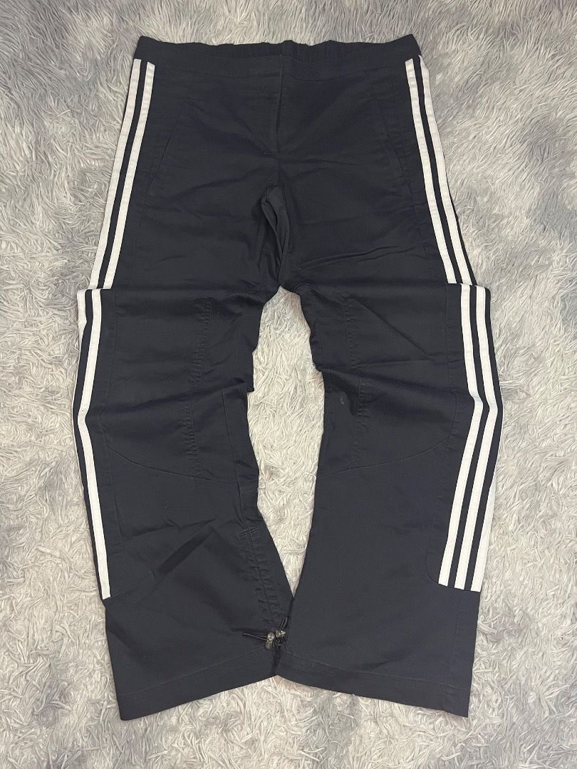 Adidas Clima365 Track Pants Black White Stripes (Category: Joggers) located in Muntinlupa City. Submitted by pastforwardthrift (Listing ID 1464097704, Image 1). Description: - Black Adidas track pants - White stripes down the sides - Clima365 material for comfort and performance - Elastic waistband with adjustable drawstring - Zippers at the ankle for easy on/off - Size Medium (M) - Ideal for sports, gym, or everyday casual wear.