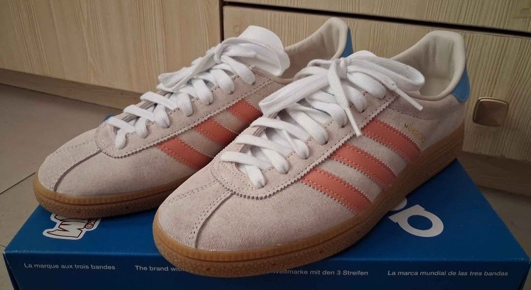adidas munchen rare release (Category: Sneakers) located in Manila. Submitted by rlv777 (Listing ID 1464057737, Image 2). Description: - Rare Adidas Munchen sneakers - Size: EU 41 / UK 7 / US 8 - Color: Creamy beige suede with coral stripes and light blue heel detail - Features classic gum sole - A unique and sought-after retro design.
