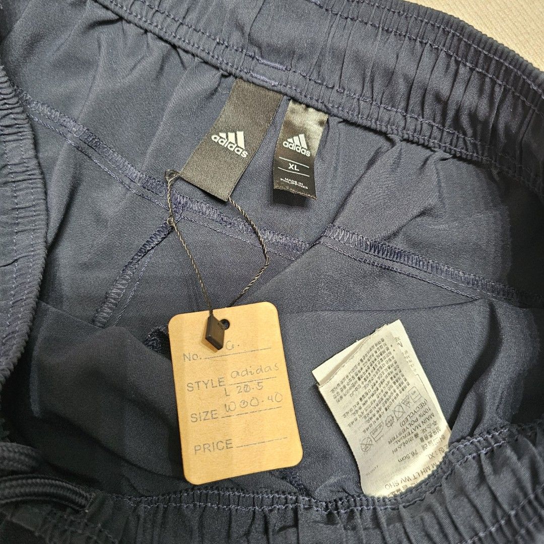 Adidas Navy Shorts (Category: Shorts) located in Baguio. Submitted by kayeonlineshop (Listing ID 1463993342, Image 3). Description: navy blue adidas Run It Shorts featuring an elastic drawstring waistband and the signature logo printed near the lower hem w30-40 L20.5 h24.5.
