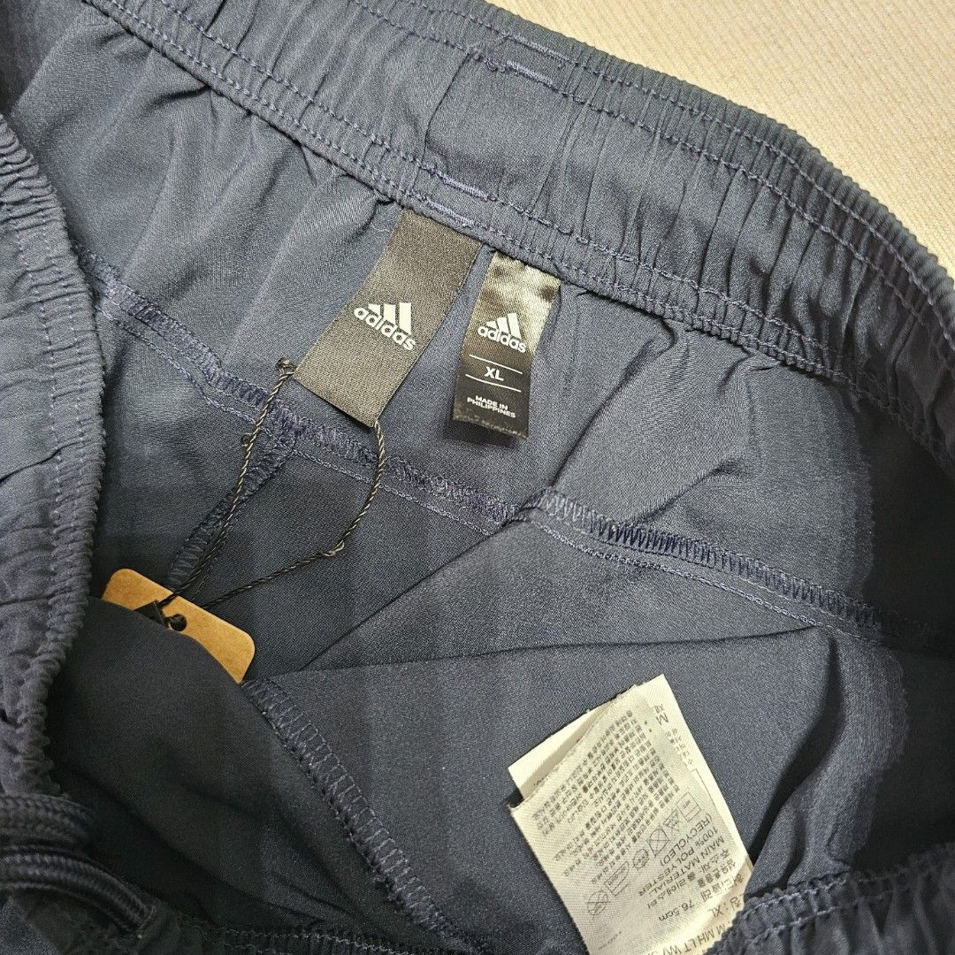Adidas Navy Shorts (Category: Shorts) located in Baguio. Submitted by kayeonlineshop (Listing ID 1463993342, Image 2). Description: navy blue adidas Run It Shorts featuring an elastic drawstring waistband and the signature logo printed near the lower hem w30-40 L20.5 h24.5.