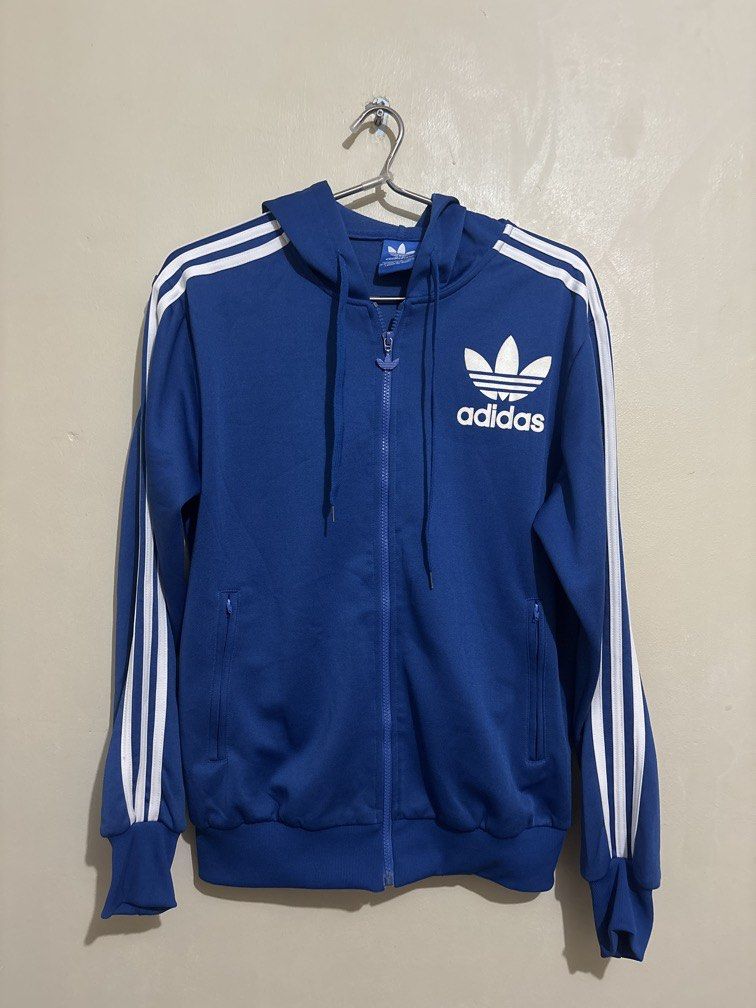 Adidas Originals Jacket (Category: Coats, Jackets and Outerwear) located in Muntinlupa City. Submitted by owrayttttt (Listing ID 1464008514, Image 1). Description: - Adidas Originals Trefoil Zip up Jacket - Dimes is 22x27 - No issue - Complete tags - Free shipping via j&t.