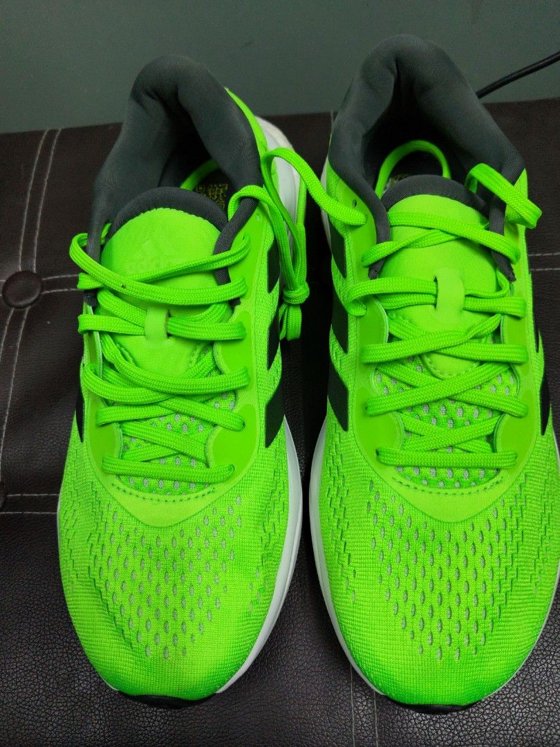 Adidas Supernova Running Shoes - Bright Green (Category: Sneakers) located in Paranaque City. Submitted by joycelyn10 (Listing ID 1463953628, Image 2). Description: - Bright green Adidas Supernova running shoes - Made with lower footprint materials - Great for runs or everyday wear - Comfortable and stylish.