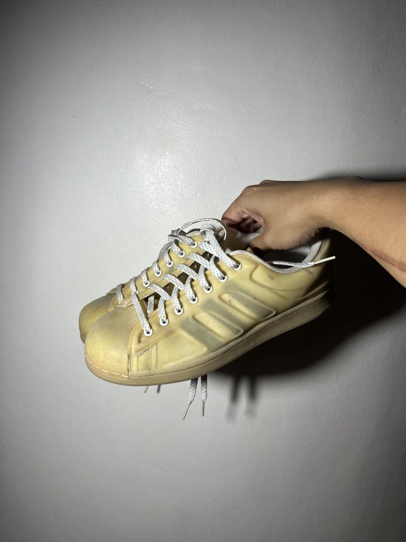 Adidas Superstar Transparent Shell Toe Sneakers (Category: Sneakers) located in Cavite. Submitted by majaco (Listing ID 1464059360, Image 1). Description: - Iconic Adidas Superstar sneakers - Without the Original Box - Classic shell toe design - White laces and signature three stripes - Soles show some wear, but plenty of life left - Perfect for collectors or as a bold fashion statement - It was original white transparent, due to time it wore off