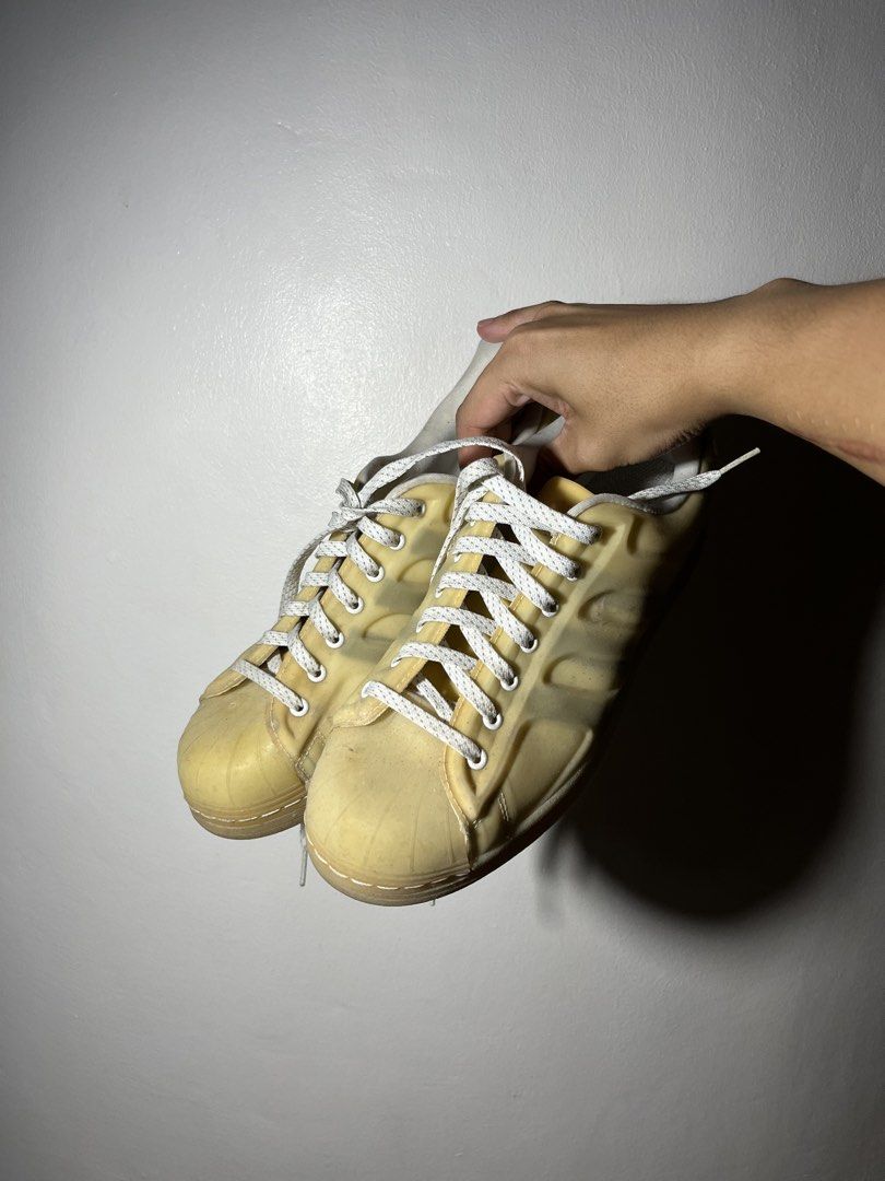 Adidas Superstar Transparent Shell Toe Sneakers (Category: Sneakers) located in Cavite. Submitted by majaco (Listing ID 1464059360, Image 2). Description: - Iconic Adidas Superstar sneakers - Without the Original Box - Classic shell toe design - White laces and signature three stripes - Soles show some wear, but plenty of life left - Perfect for collectors or as a bold fashion statement - It was original white transparent, due to time it wore off