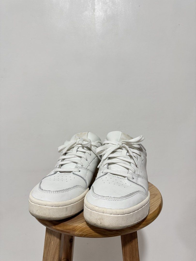 Adidas Shoes (Category: Casual Shoes) located in Angeles City. Submitted by kingfpc (Listing ID 1464047561, Image 2). Description: - Brand: Adidas - Model: Team Court 2.0 - Color: White - Size: EU 44 (UK 9.5 / US 10) - Style: Casual Sneakers - Condition: Good, with minor signs of wear visible in photos - Features: Classic design, comfortable for everyday use.