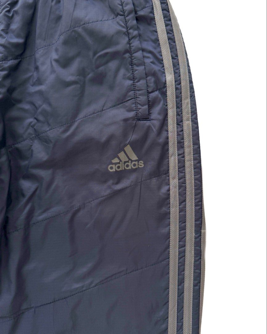 Adidas Track Pants (Category: Joggers) located in Manila. Submitted by morf_sply (Listing ID 1464002471, Image 2). Description: Regular fit classic sport tracksuit bottoms with technical utility fabric for intense workout. Bold stripes sideways with a drawcord closure for an adjustable fit.S on tag. Waist in 28-32 Rise 10 in Inseam 29 in Length 39 in Leg Opening 8 in .