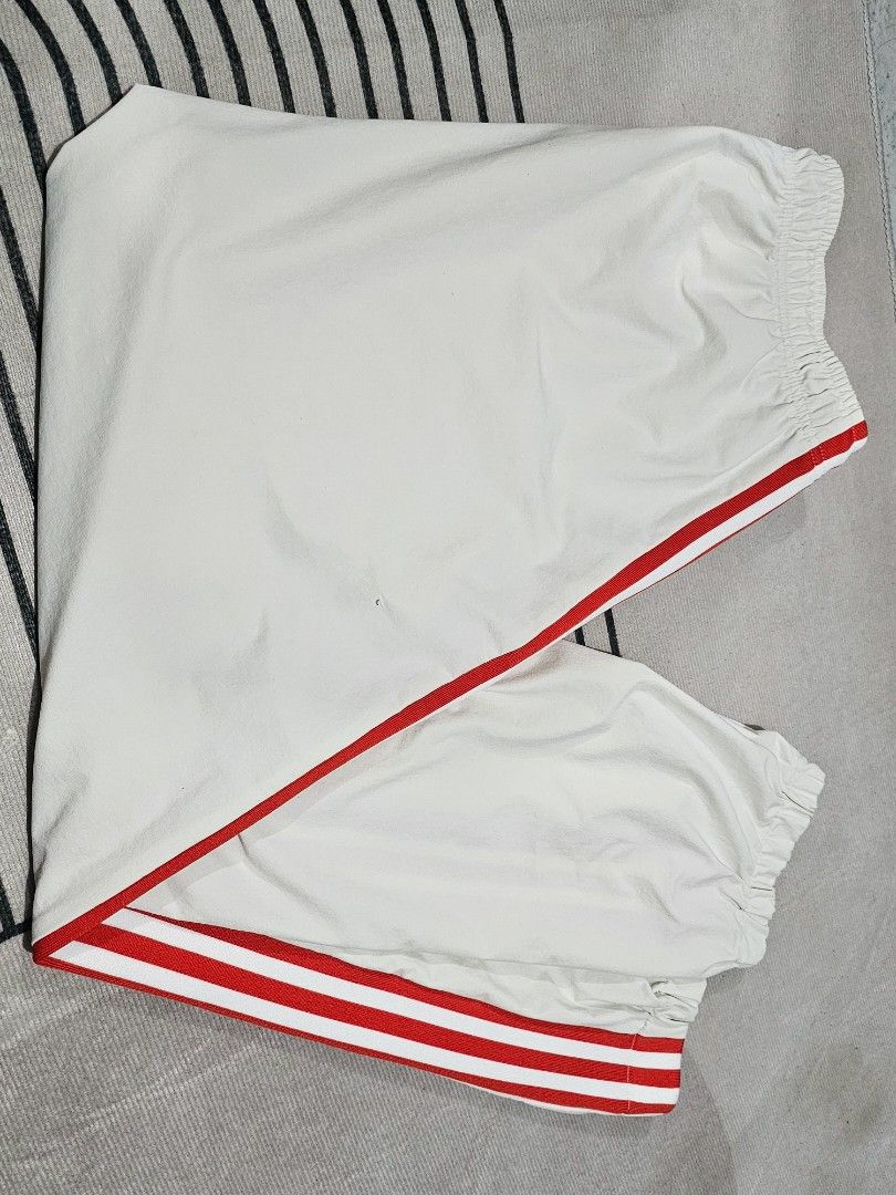 Adidas White Red Joggers (Category: Joggers) located in Baguio. Submitted by kayeonlineshop (Listing ID 1464027906, Image 3). Description: adidas MDN Track Pant in white, featuring bold red side stripes and zippered front pockets w 34 max l36.