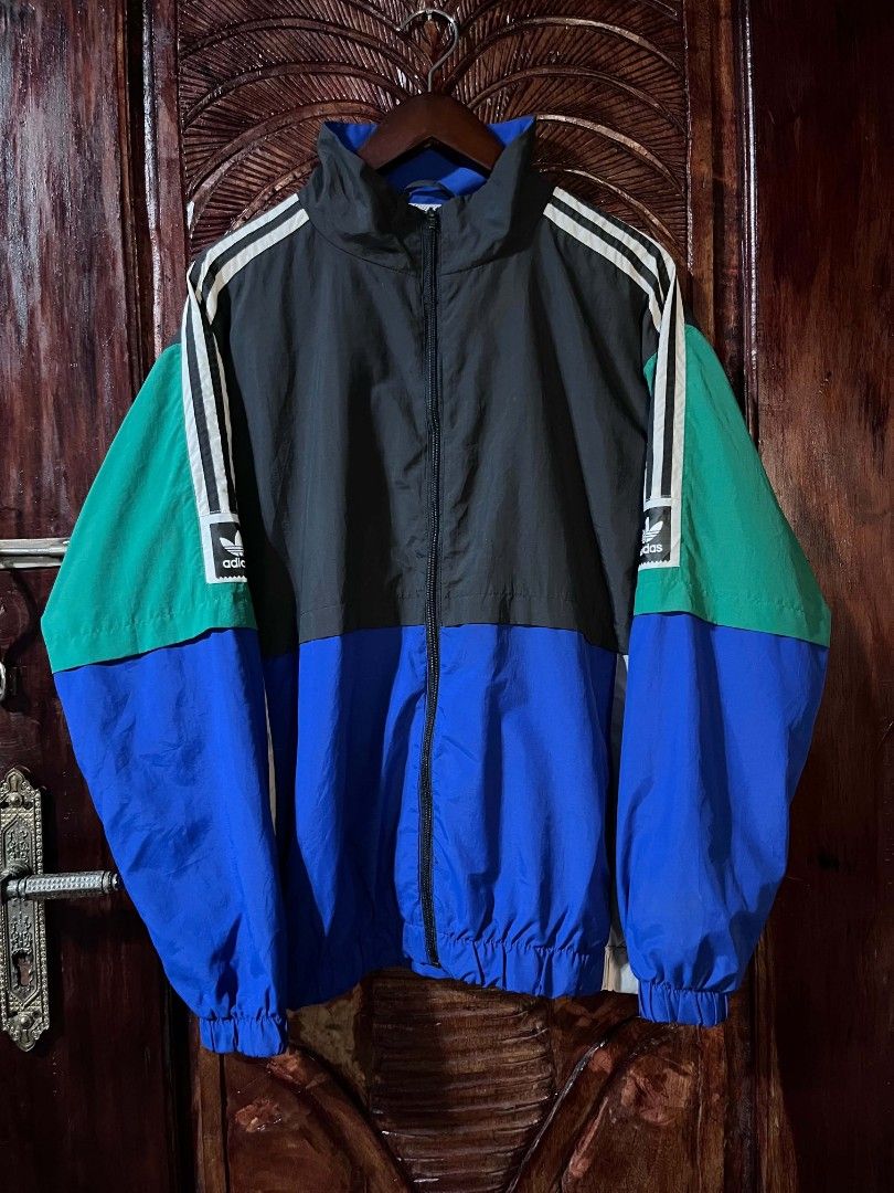 Adidas WINDBREAKER TRI COLOR (Category: Coats, Jackets and Outerwear) located in Bulacan. Submitted by 1008.thrift (Listing ID 1464043712, Image 1). Description: ADIDAS WINDBREAKER TRI COLOR SIZE XLARGE W25 x L28 EXCELLENT CONDITION NO ISSUE.