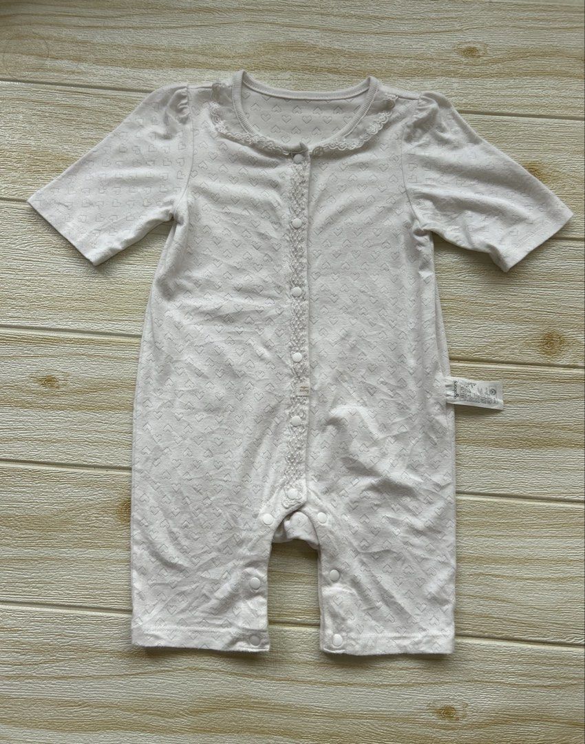 Agabang white soft romper 12m (Category: Babies & Kids Fashion) located in Cebu City. Submitted by yjainani (Listing ID 1464032492, Image 1). Description: a delicate lace-trimmed Peter Pan style collar, and center snap-button closures running down the front and legs for convenient changing. The lightweight, breathable pointelle pattern is popular for warm-weather innerwear and sleepwear..