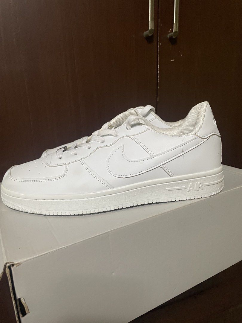 Air Force 1 - Triple White (Category: Casual Shoes) located in Manila. Submitted by clothingrevival (Listing ID 1463980358, Image 2). Description: - Brand New condition - Size 10W/8.5M - No box.