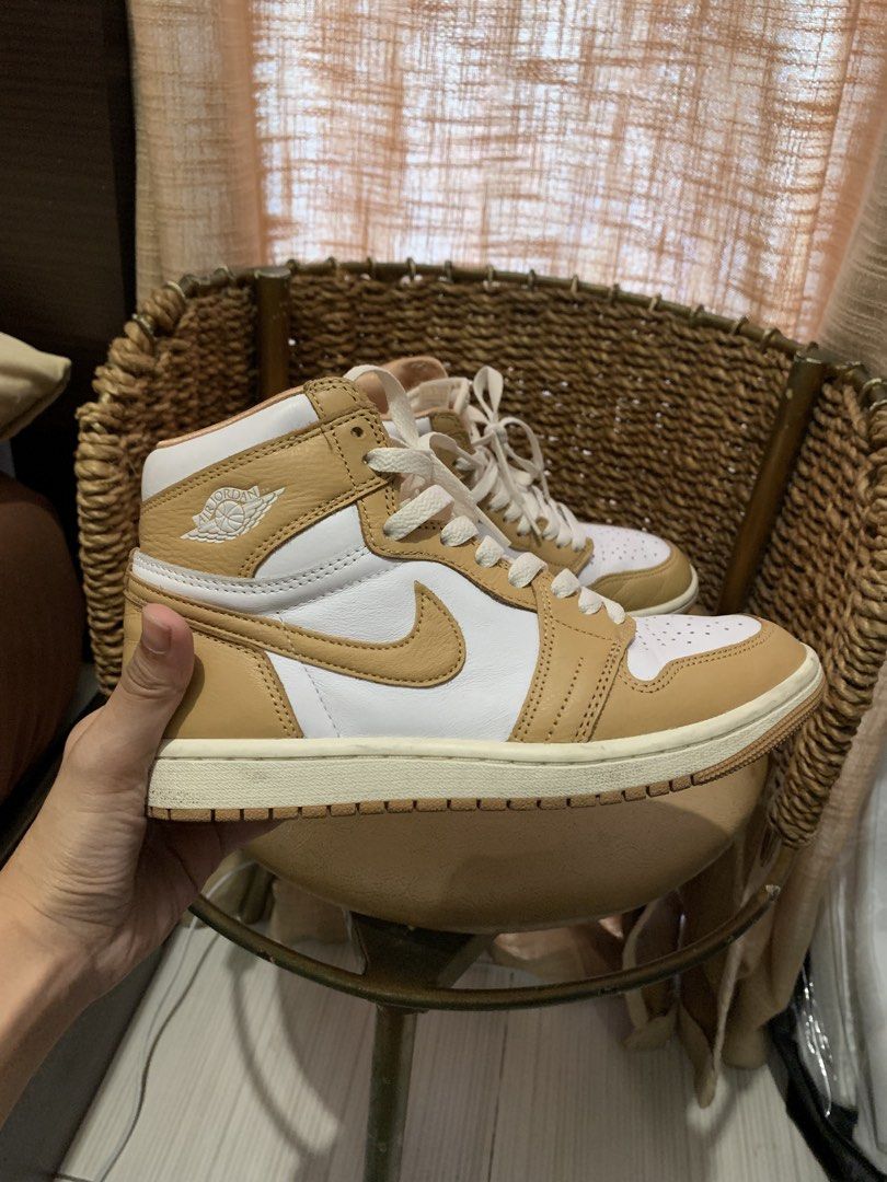 Air Jordan 1 High OG Praline (Category: Sneakers) located in Paranaque City. Submitted by zyyee (Listing ID 1463943309, Image 1). Description: - Air Jordan 1 High OG - Colorway: Praline and White - Classic high-top silhouette - Premium leather upper - Perforated toe box for breathability - Iconic Air Jordan Wings logo on the ankle - Cream-colored laces with extra satin laces and box -Just needs cleaning, excellent condition - Perfect addition to 
