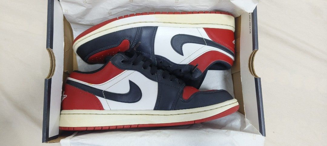 Air Jordan 1 Low Bred toe (Category: Sneakers) located in Anda. Submitted by Pollit0_77 (Listing ID 1464072882, Image 1). Description: - Authentic Air Jordan 1 Low sneakers - Colorway: Gym Red, White, and Black - Size: US 7.5 (UK 6.5, EUR 40.5) - Includes original box - A must-have for any sneaker enthusiast or collector.