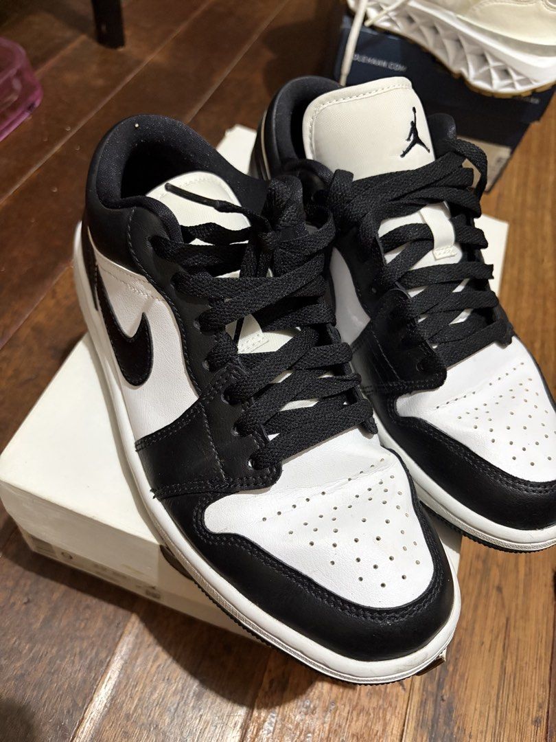 Air Jordan 1 Low WMNS White Black (Category: Sneakers) located in Pasig City. Submitted by preloved_items_roche (Listing ID 1464014108, Image 3). Description: - Brand: Nike Air Jordan 1 Low - Colorway: White and Black - Size: 9 US Women's - Condition: Comes with original box - Ideal for: Casual wear and everyday style With box and receipt.