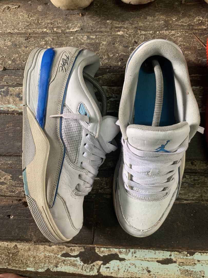 Air Jordan Flight Court (Category: Sneakers) located in Manila. Submitted by wildfire.33cd8c (Listing ID 1464126375, Image 3). Description: - White and blue Air Jordan Flight Club 91 sneakers - Classic basketball shoe design - Shows some signs of wear on soles and uppers - White laces - Perfect for casual wear or collectors.