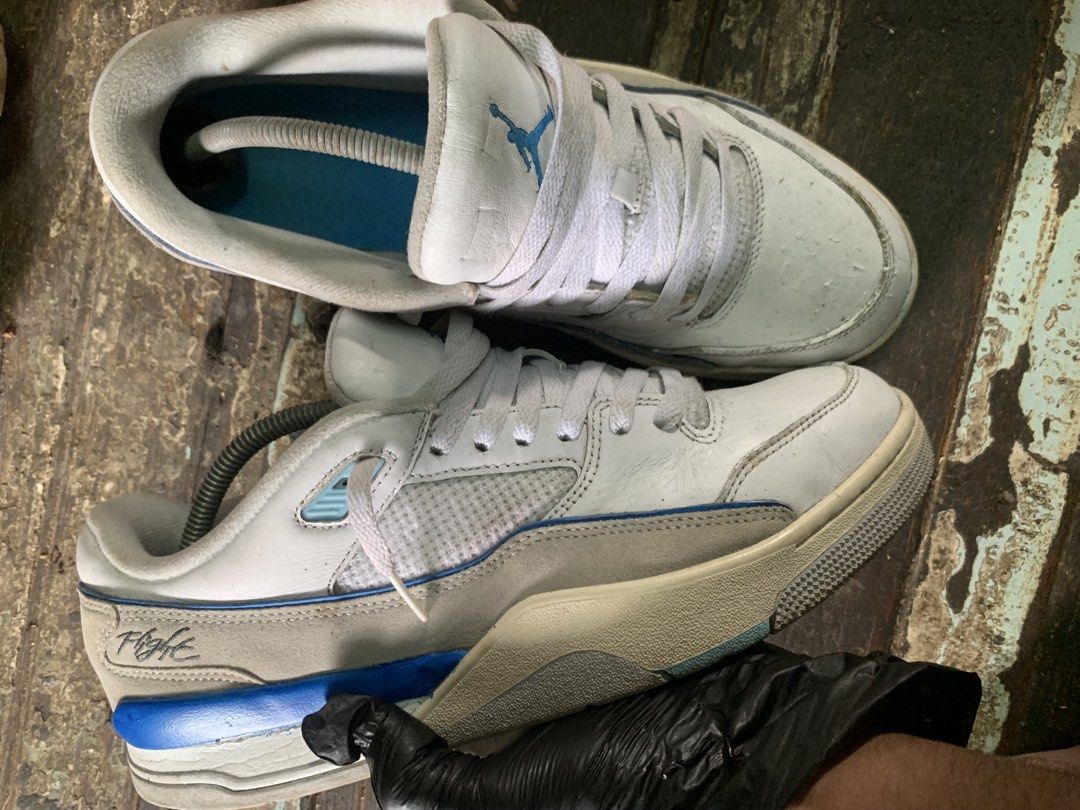Air Jordan Flight Court (Category: Sneakers) located in Manila. Submitted by wildfire.33cd8c (Listing ID 1464126375, Image 1). Description: - White and blue Air Jordan Flight Club 91 sneakers - Classic basketball shoe design - Shows some signs of wear on soles and uppers - White laces - Perfect for casual wear or collectors.
