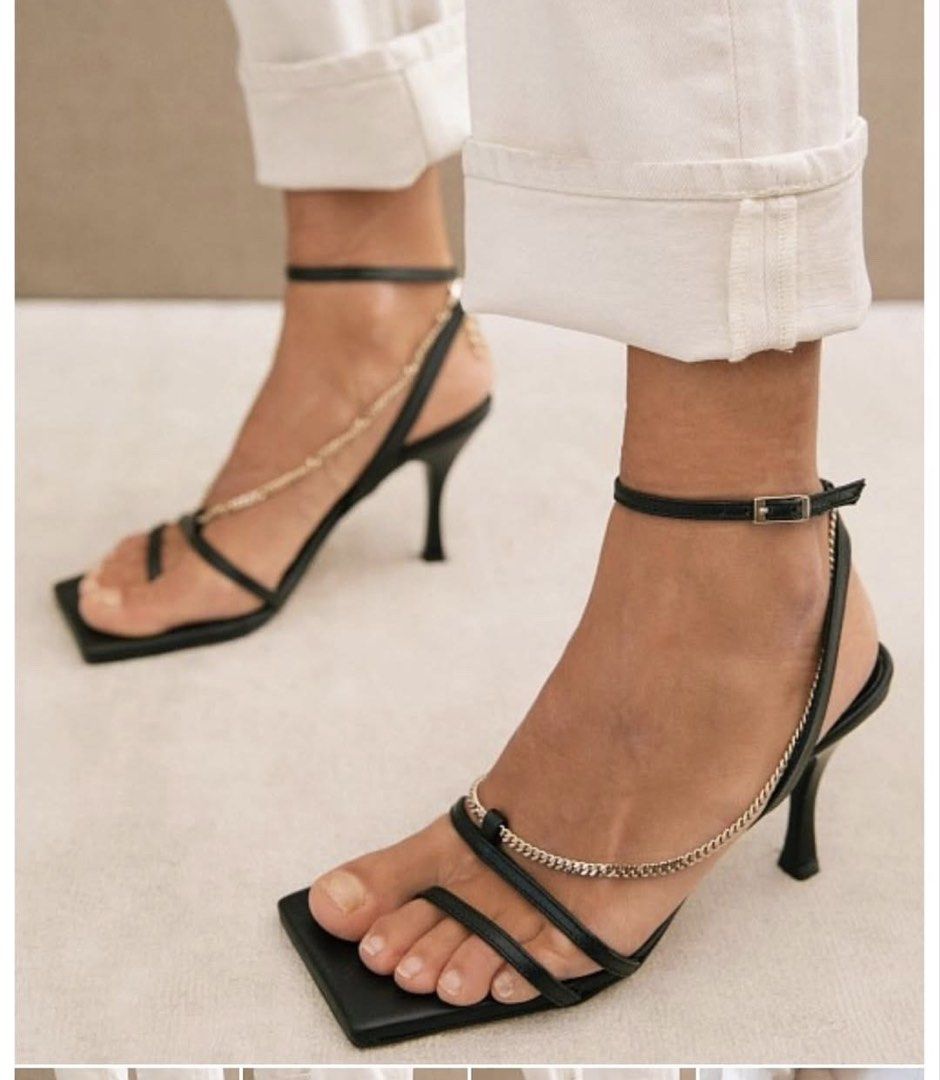 ALOHAS Black Square Toe Chain Heeled Sandals (Category: Heels) located in Mandaluyong City. Submitted by shopria0116 (Listing ID 1463951390, Image 2). Description: - Brand: ALOHAS - Color: Black - Style: Heeled Sandals - Toe Shape: Square Toe - Detail: Delicate gold chain across the front - Closure: Ankle strap with buckle - Design: Chic and modern - Versatility: Great for dressing up or down.